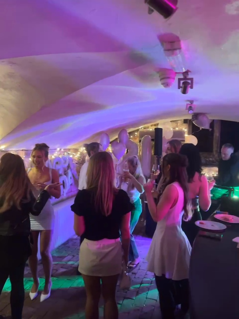 Guests enjoying live music at The Silk House main bar